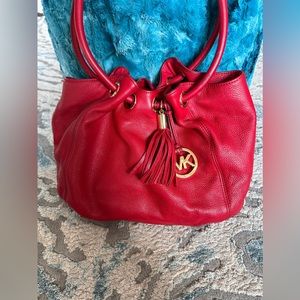 Red Michael Kors Handbag with Gold Hardware